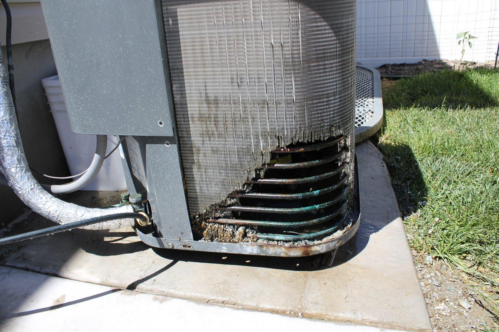 Old residential air conditioner that may need repair or replacement